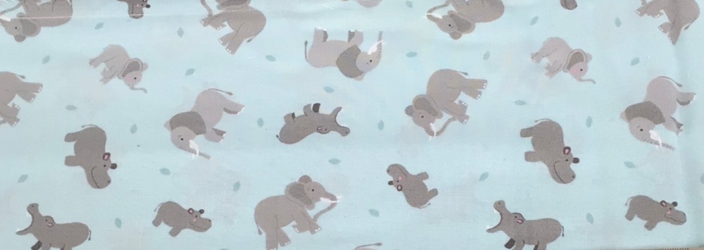 Lewis and Irene | Small Things... Wild Animals | Elephants and Hippos on Light Blue (£12.60 metre)