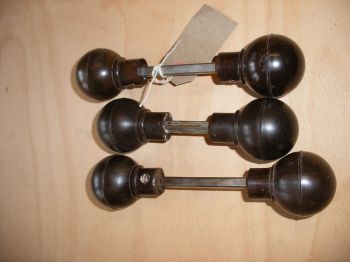 Reclaimed round bakelite door handles.