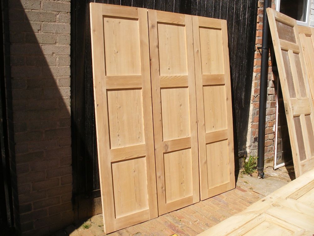 Set of 3 large reclaimed stripped pine cupboard doors