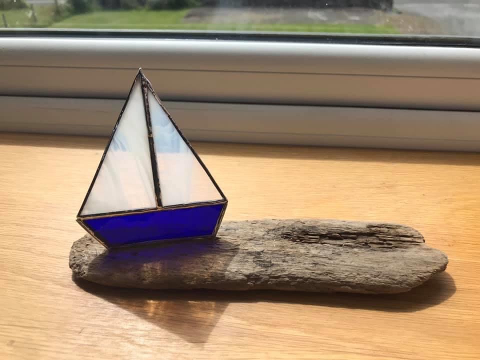 Boat on driftwood