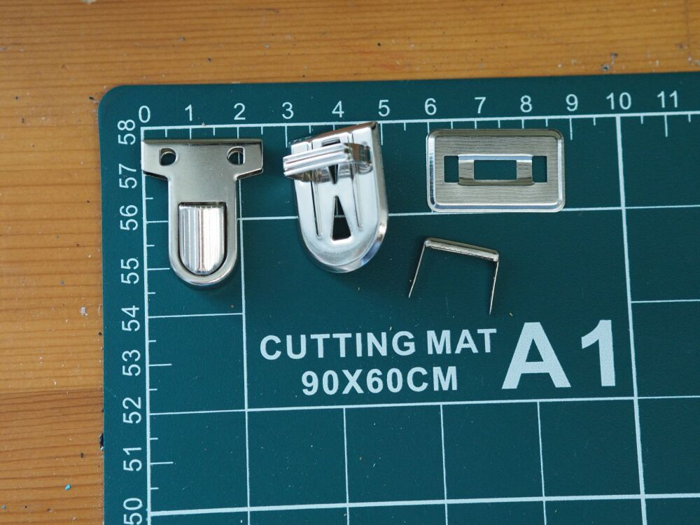 Silver coloured Tuck locks