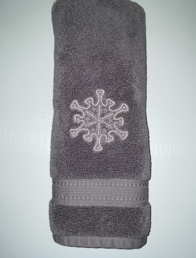 Dark grey Hand towel embroidered with a silver snowflake