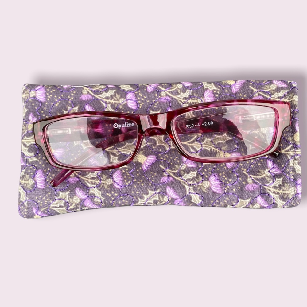 Thistle glasses case with heart stitching detail