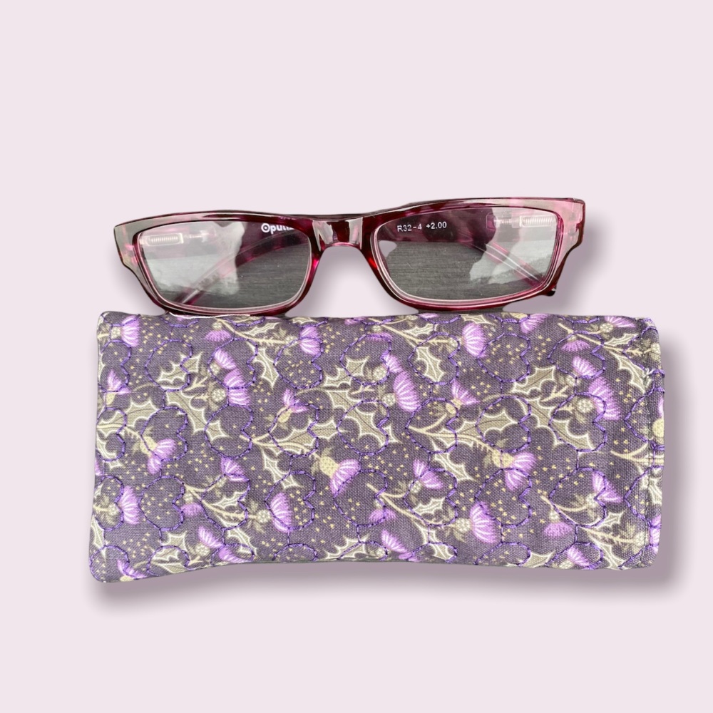 Thistle glasses case with hexagonal stitching detail 