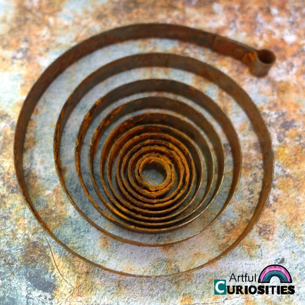 Clocks/Watches/Parts - Small Rusty Metal Mainspring - AC435