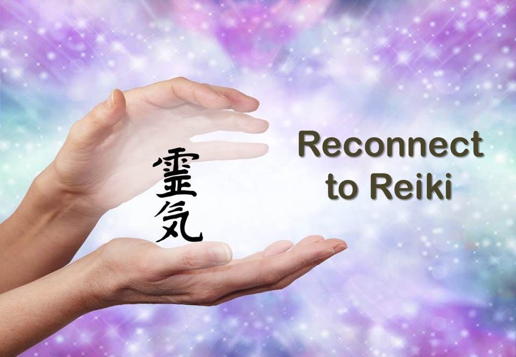 Hands holding Reiki Kanji