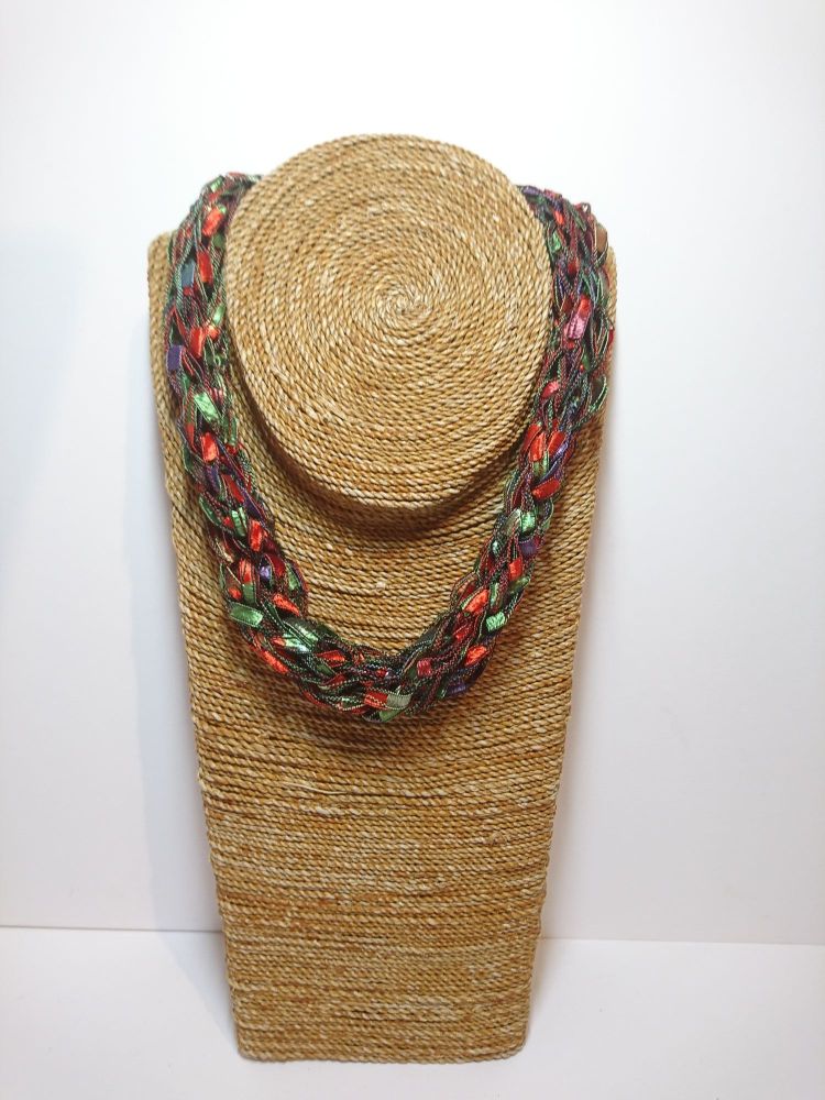 Finger knitted necklace in red multicolour