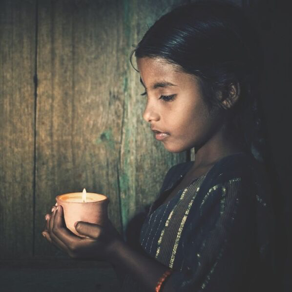 Deepti-Holding-Candle-1200x700-1-1024x597-2