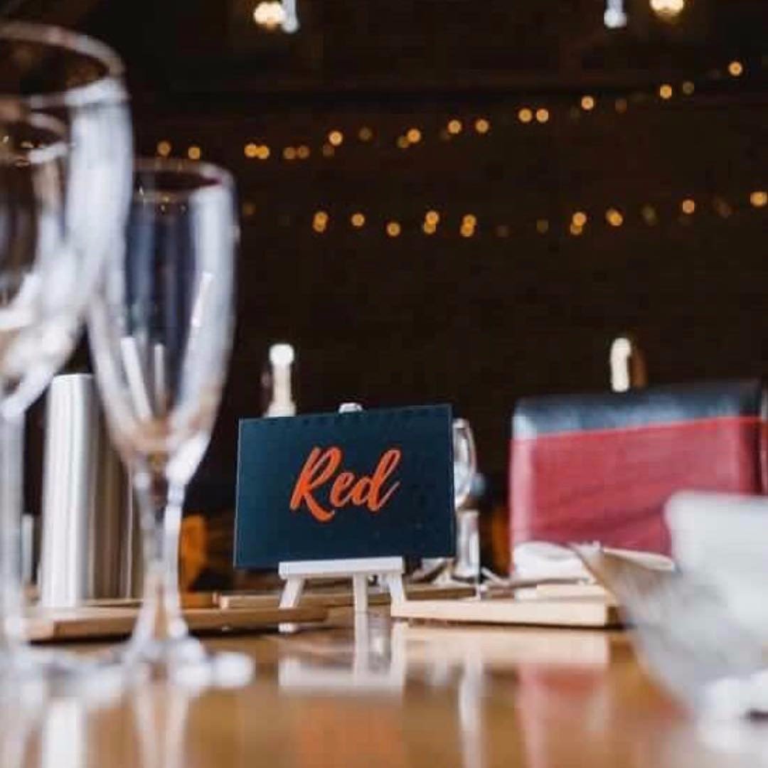 Chalkboard table name with red vinyl