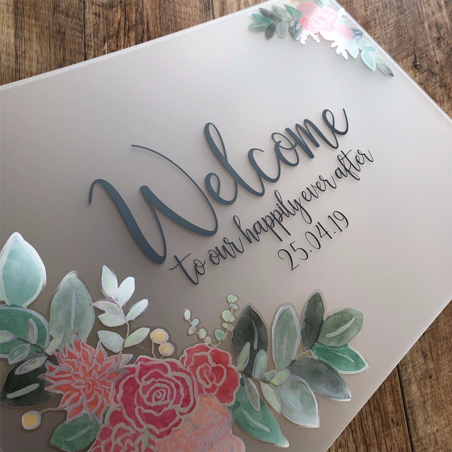 Frosted acrylic wedding welcome sign with flower detail