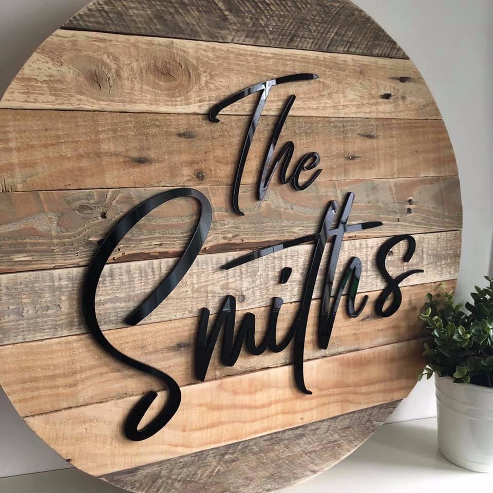 Reclaimed pallet wood home decor family name design