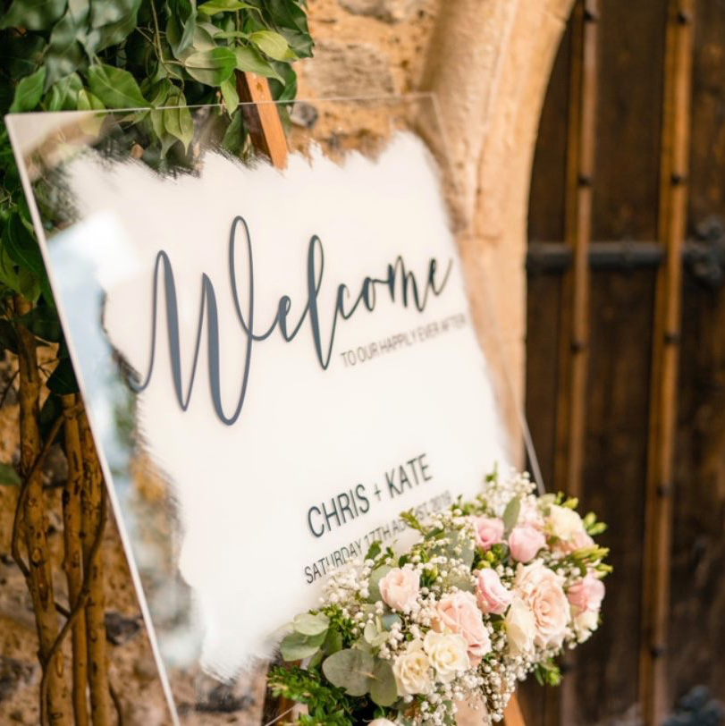 painted back perspex wedding welcome sign