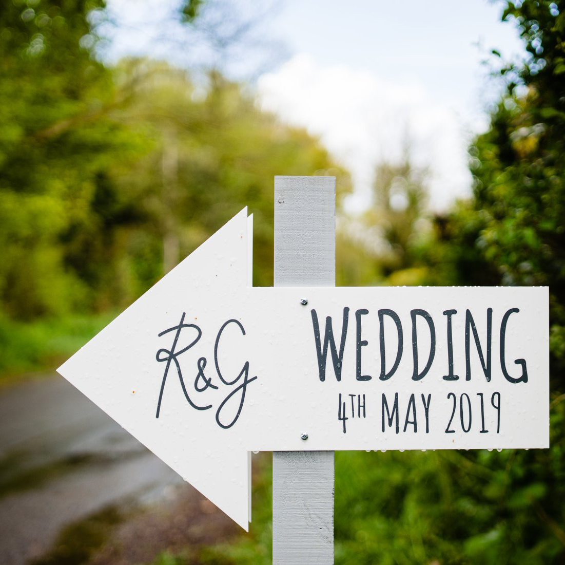 wedding direction sign post