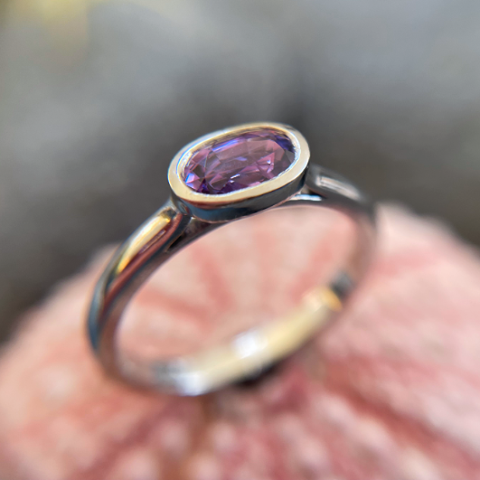 Purple sapphire & platinum engagement ring