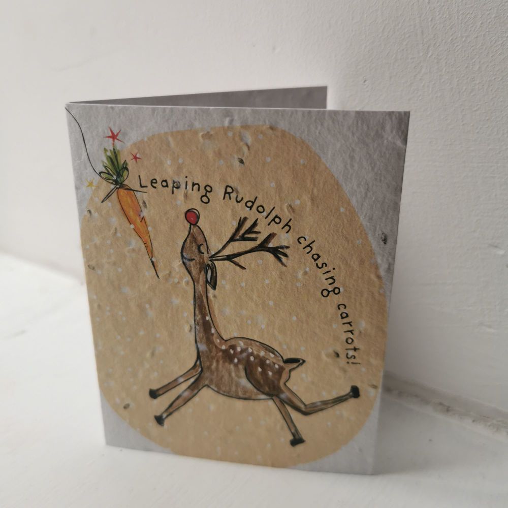 Leaping Rudolph Chasing Carrots Card by Hannah Marchant