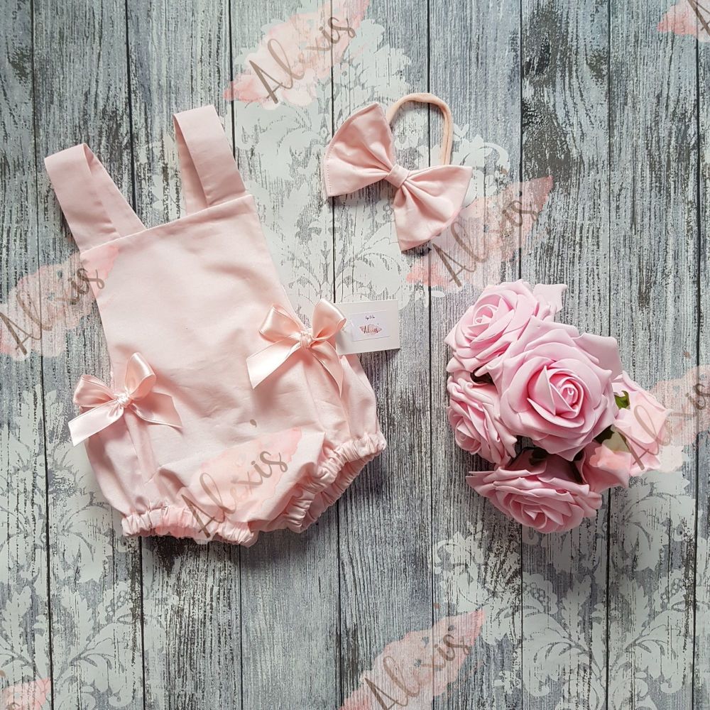 Baby pink bow romper