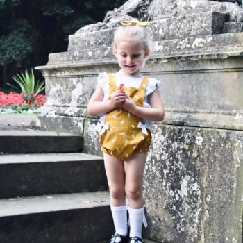 Mustard feather bow romper