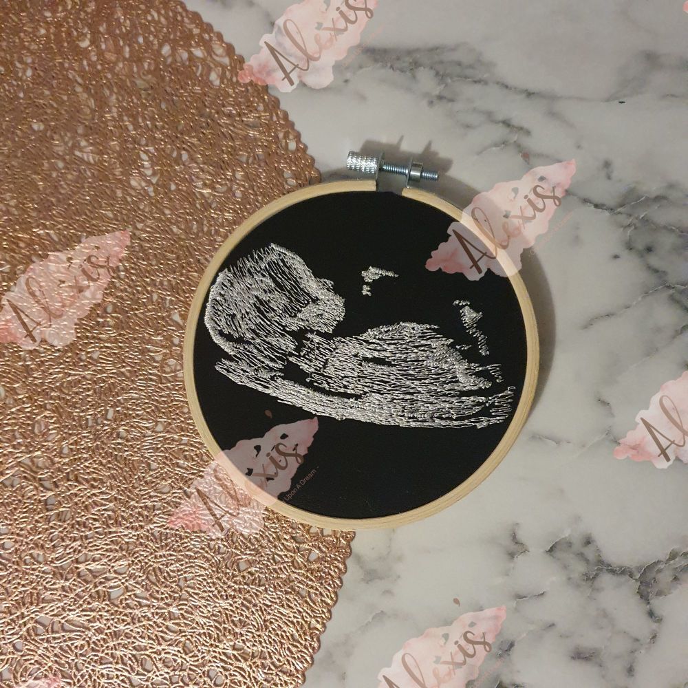 Embroidered baby scan