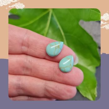 Pack of 2 synthetic turquoise cabochons 14x10mm