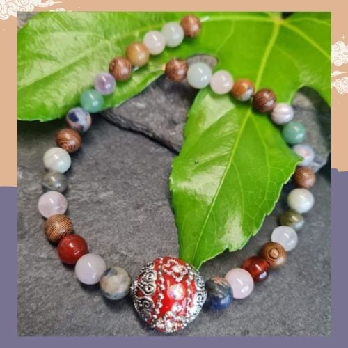 11 Inch Gemstone Strand with Indonesian focal bead
