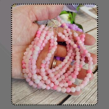 7.25 inch strand frosted pink fire Agate 6mm.