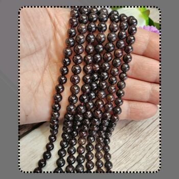 7.5 inch strand 6mm Garnet gemstone bead strand.
