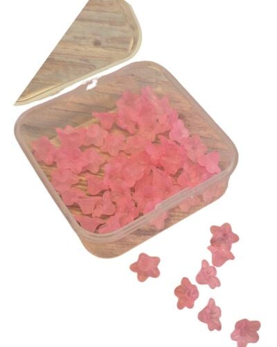 Small box of 50 baby pink lucite flowers 10x7mm