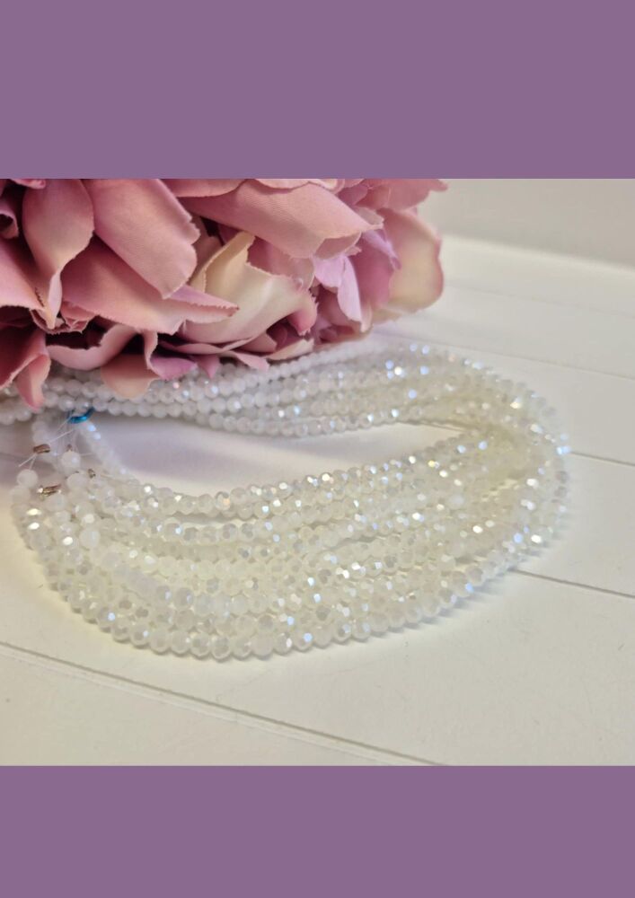 FLASH SALE 3x4mm ice white crystal rondelles.