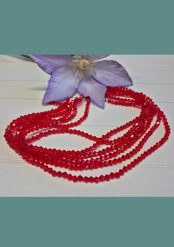 FLASH SALE 13 inch strand Ruby flame 4mm bicones.