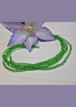 FLASH SALE 13 inch strand Spring Leaf 4mm bicones.