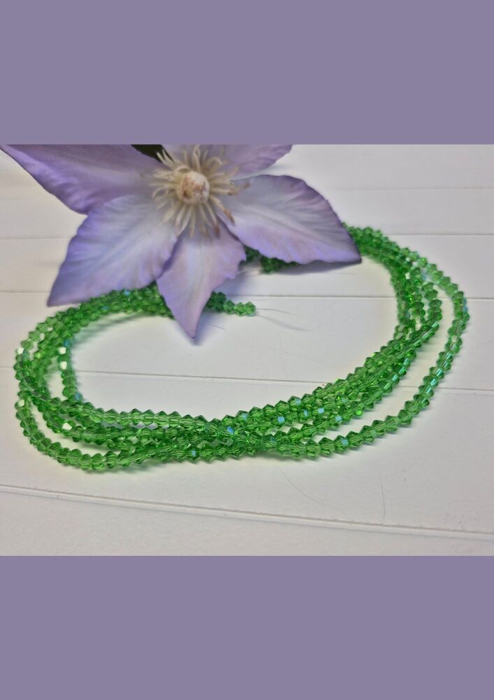 FLASH SALE 13 inch strand Spring Leaf 4mm bicones.