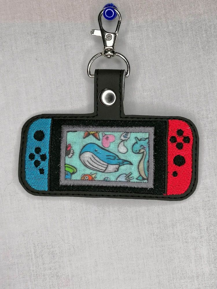 Nintendo Switch With Pokemon Inspired Embroidered Keyring - PM