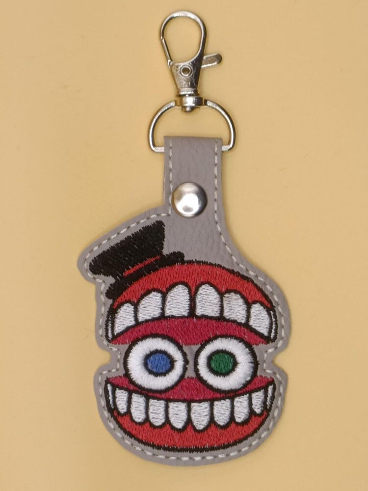 DC Caine Inspired Embroidered Keyring