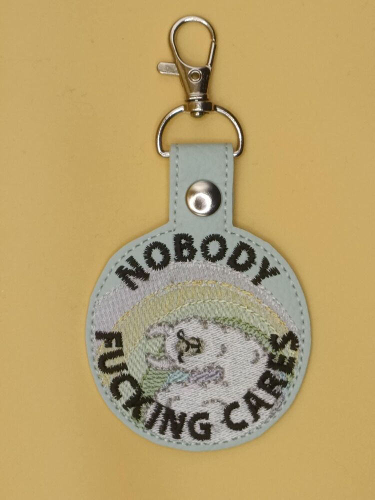 Nobody Fucking Cares Embroidered Keyring