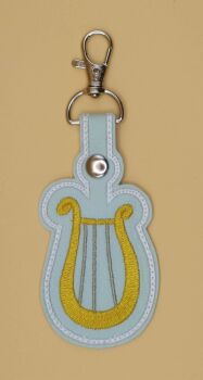 Lyra Heartstrings Cutie Mark Inspired Embroidered Keyring