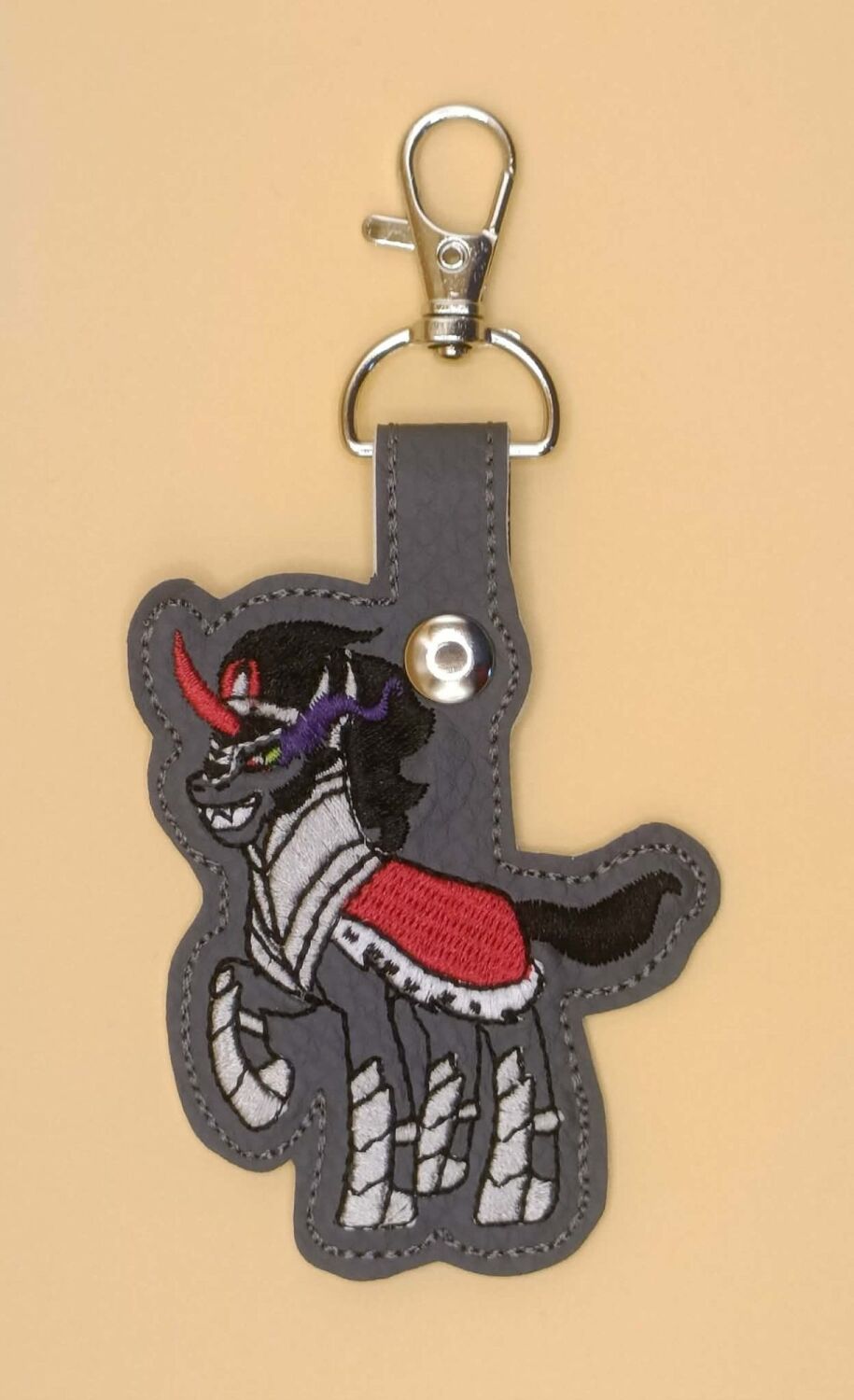 King Sombra Inspired Embroidered Keyring