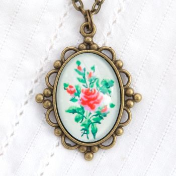 Victorian ‘Arsenical wallpaper’ roses, oval pendant