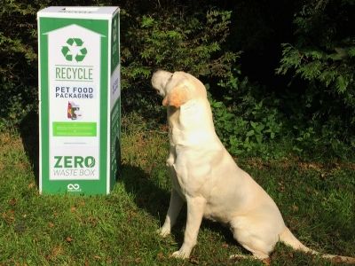 Eira looking at recycling box