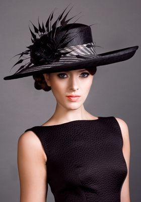Stunning black hat with beautiful feather detail