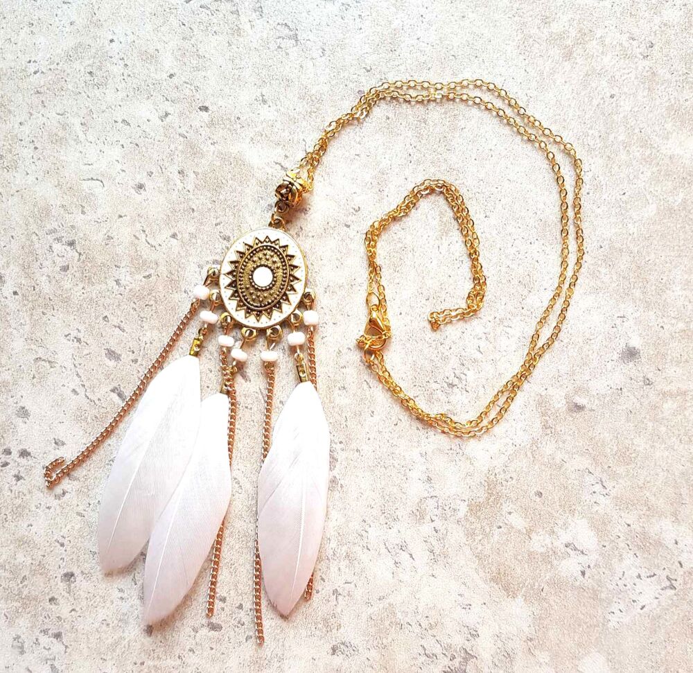 White and Gold Feather Necklace with Aztec Flair