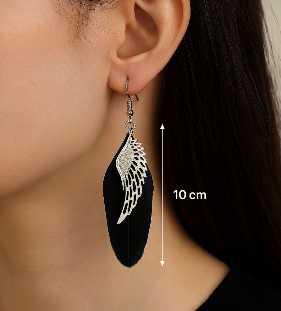 Model wearing 10cm black feather earrings with silver angel wing charms