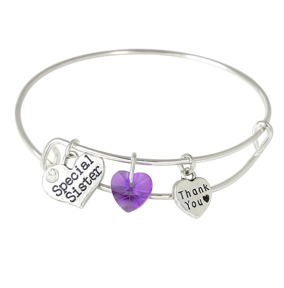 Silver bangle bracelet with three heart charms—“Special Sister” with rhines