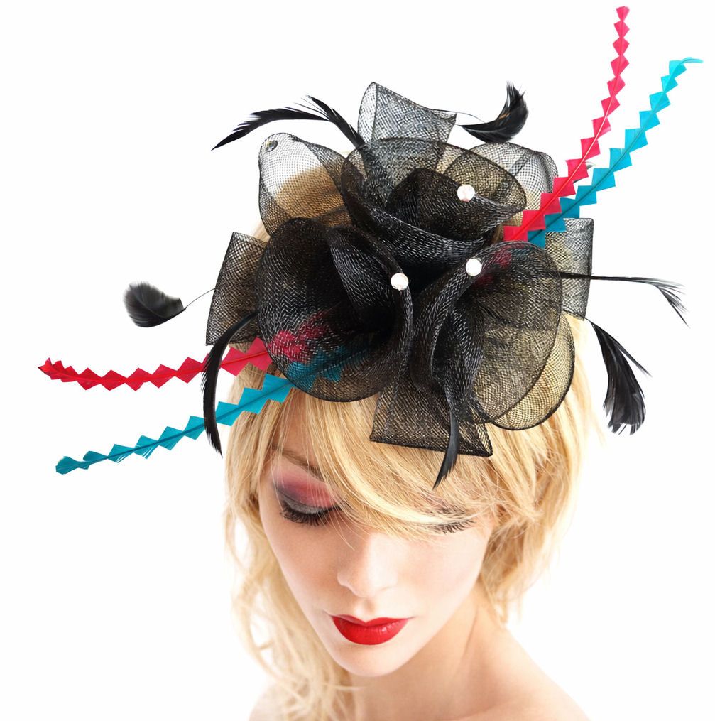 Blonde woman wearing a black mesh fascinator with pearl accents, black feat
