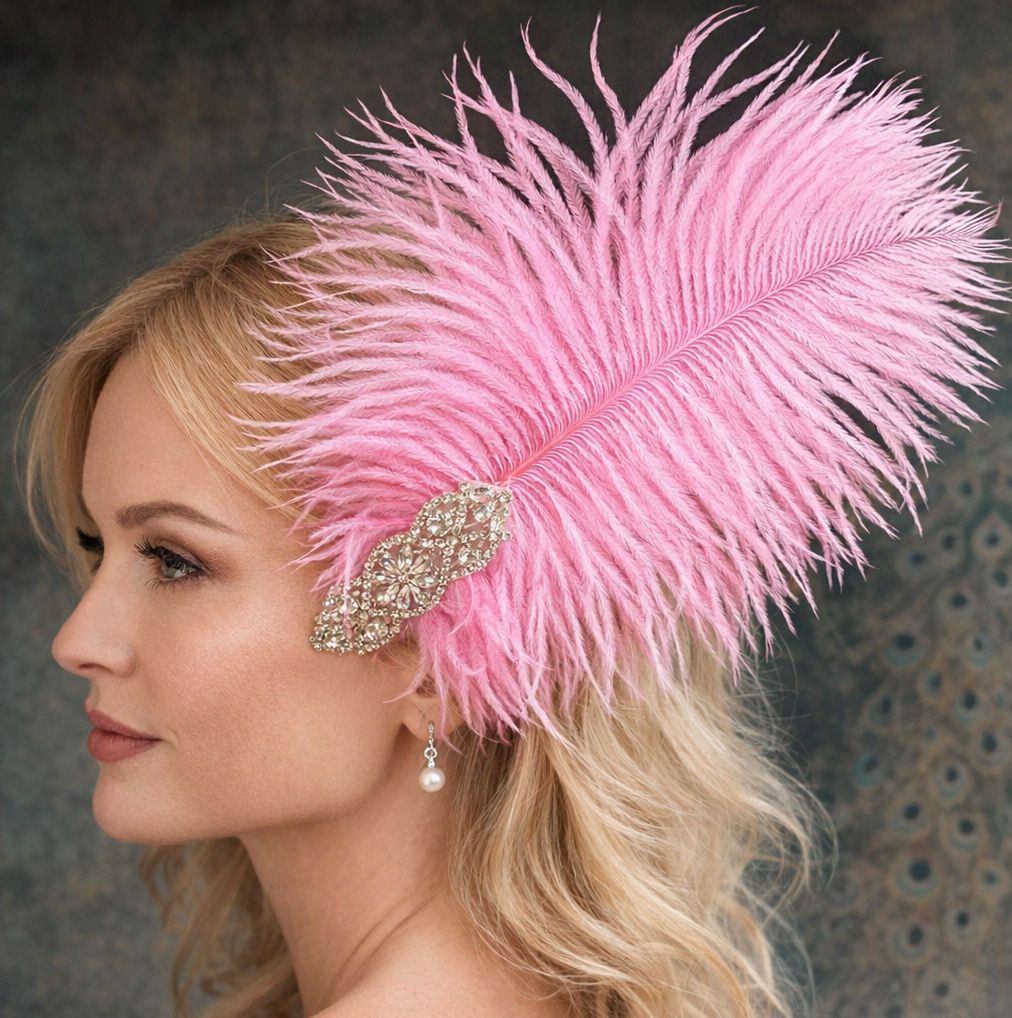 Blonde woman wearing a vibrant pink ostrich feather headpiece with rhinesto