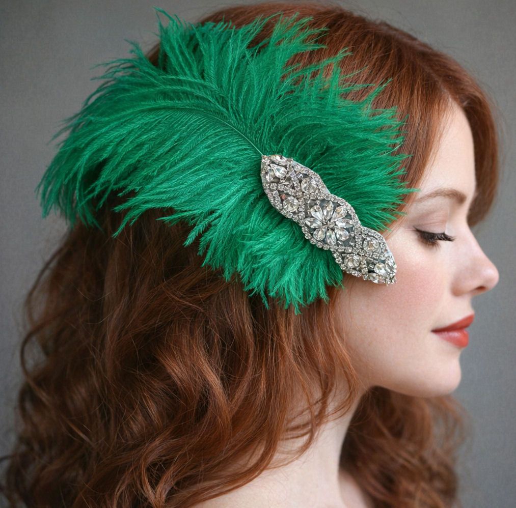 profile of a fair-skinned woman with wavy red hair wearing a dramatic green