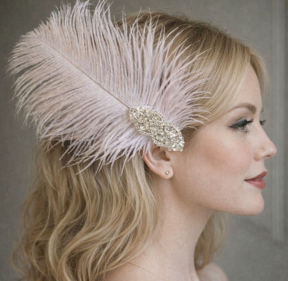 Blonde woman in profile wearing a pale lavender ostrich feather headpiece 
