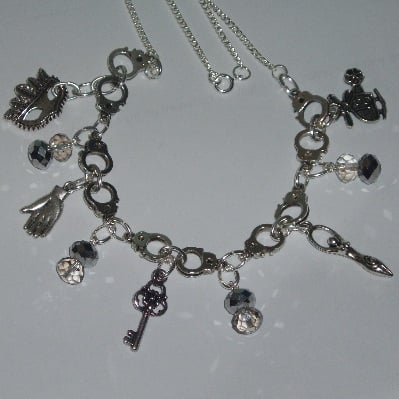 50 Shades Of Grey Handcuffs Necklace With Your Choice Of 5 Charm Drops And 4 Pairs Of Sparkling Crystal Drops On A Silver Plated Chain Must Have For Any Mr Grey Fan