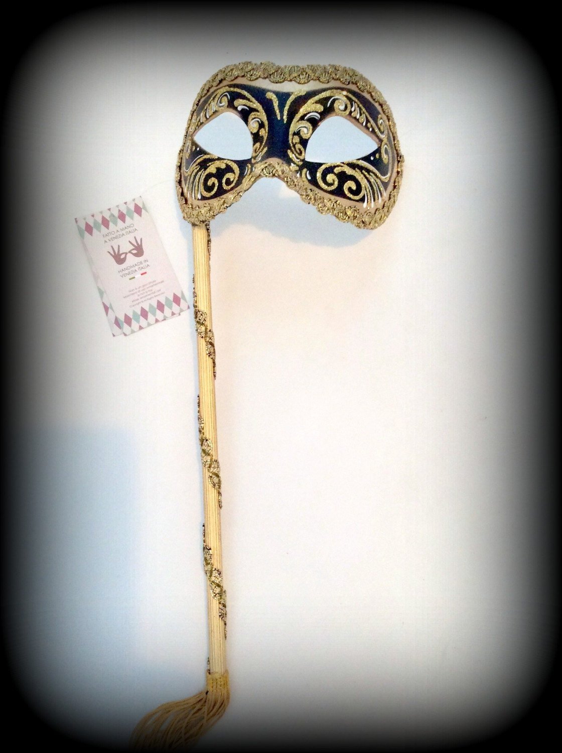 Black and Gold Masquerade Mask on a Stick