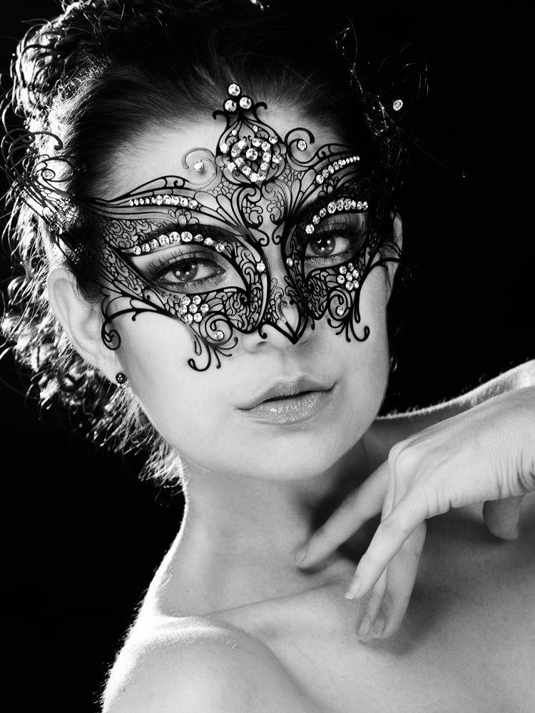 beautiful lady wearing a filigree masked ball mask - Image