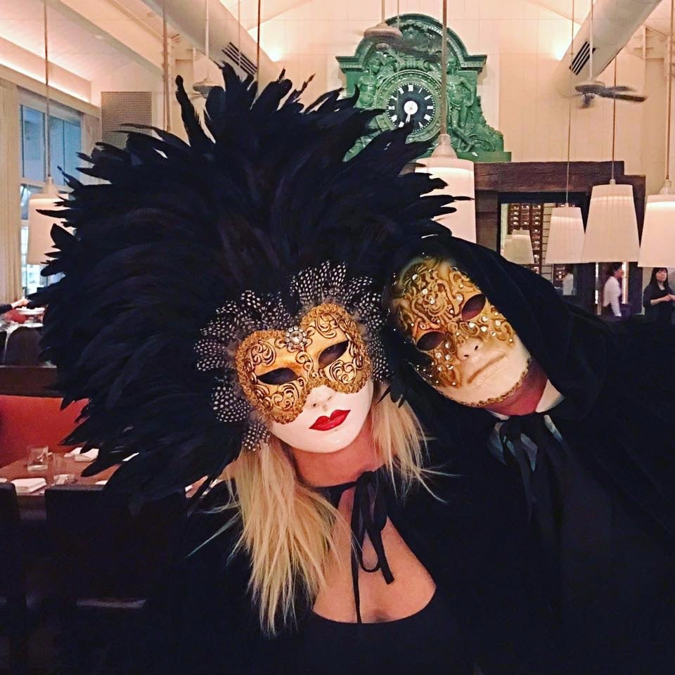 two customers of ours wearing his & hers "eyse wide shut" movies masks